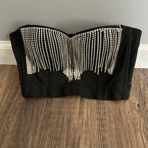 Black strapless bustier with dangling rhinestones . Never worn